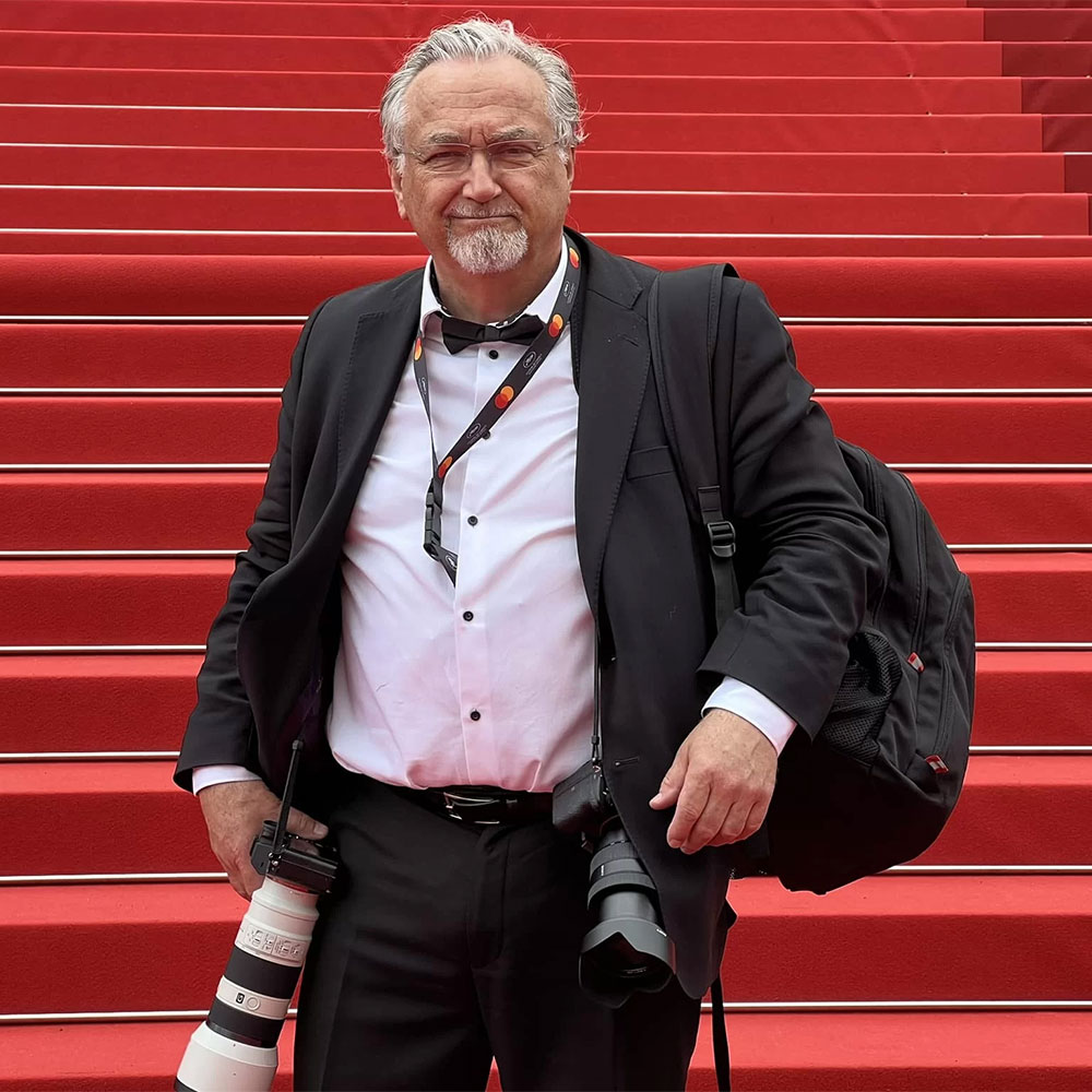 Paul Winstone, photographer on red carpet at Cannes film Festival May 2023